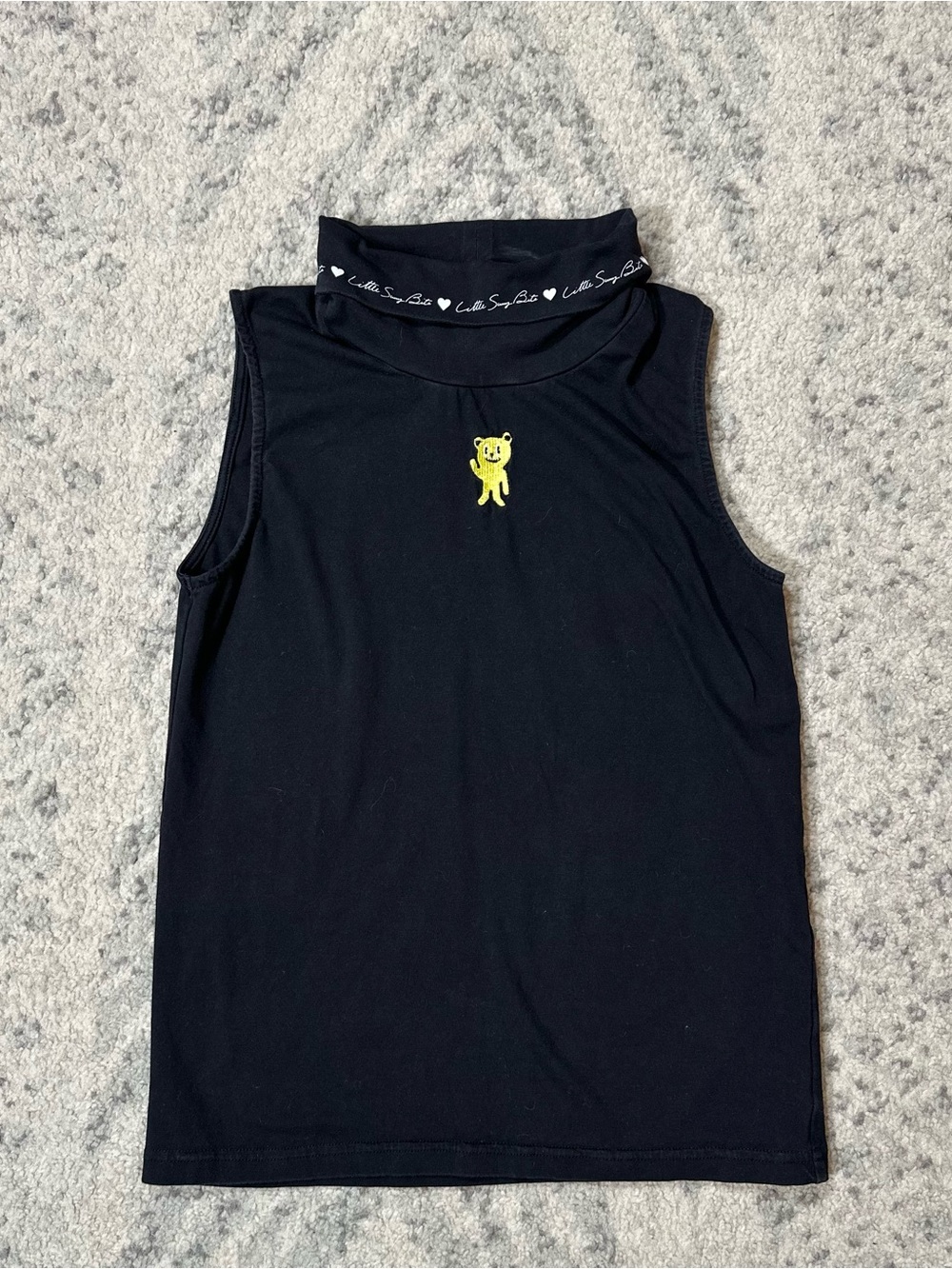 Little Sunny Bite black mock neck sleeveless top